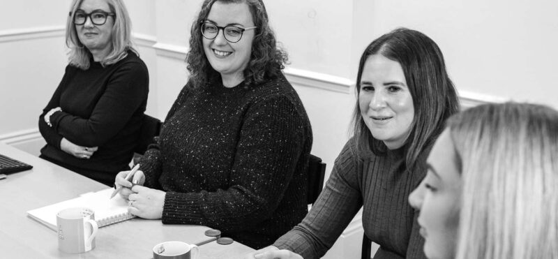 Marketing agency team sharing ideas and feedback during a collaborative discussion