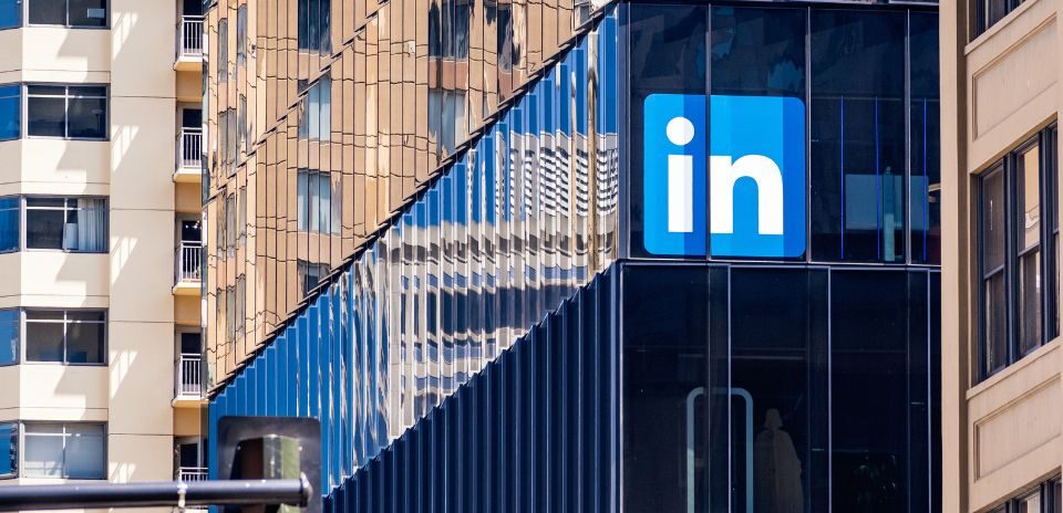 LinkedIn building in San Francisco. The building is glass and had the LinkedIn blue icon on the building.