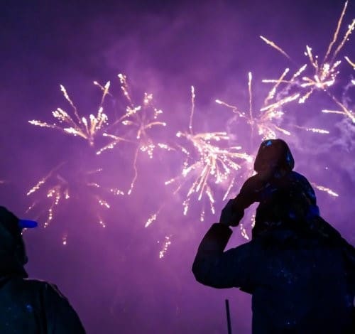 Silhouette of a family watching fireworks. Godstone Farm Mini Fireworks Festival, 24th & 25th October.