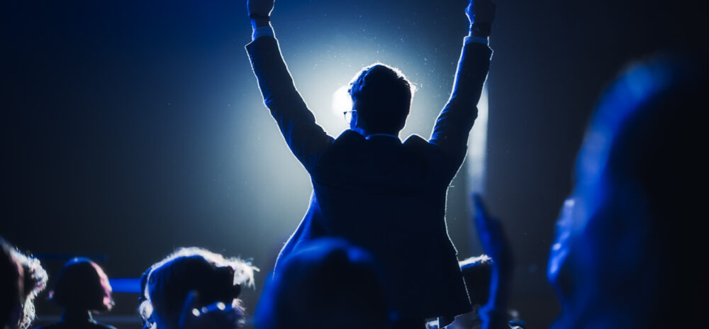 Man celebrating at Business Awards