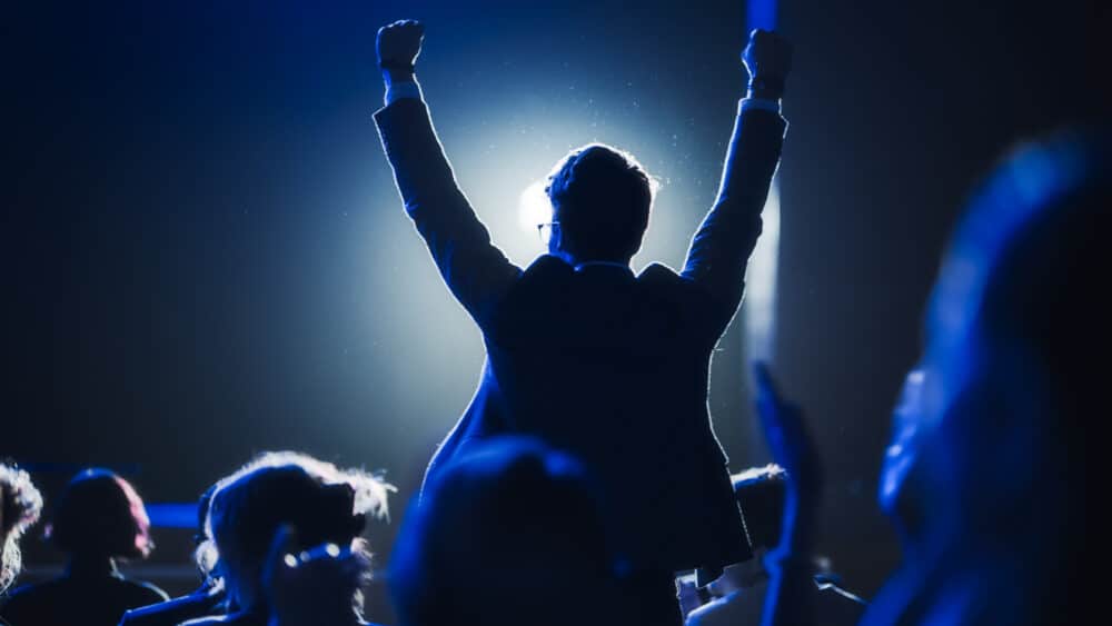 Man celebrating at Business Awards