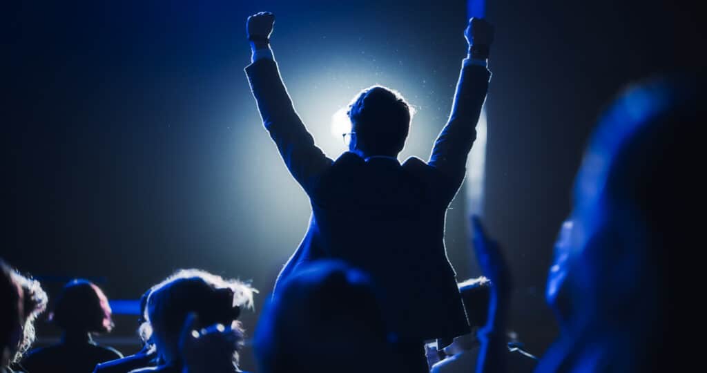 Man celebrating at Business Awards